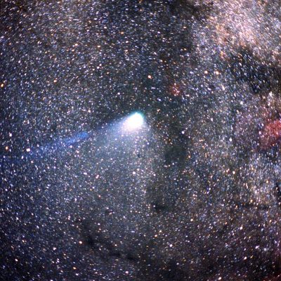 Halley’s Comet streaking across the night sky with a glowing tail