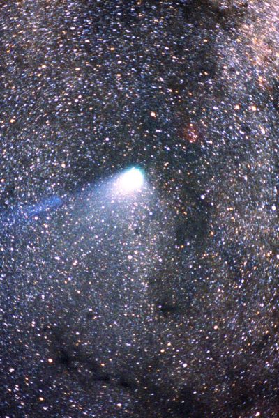 Halley’s Comet streaking across the night sky with a glowing tail